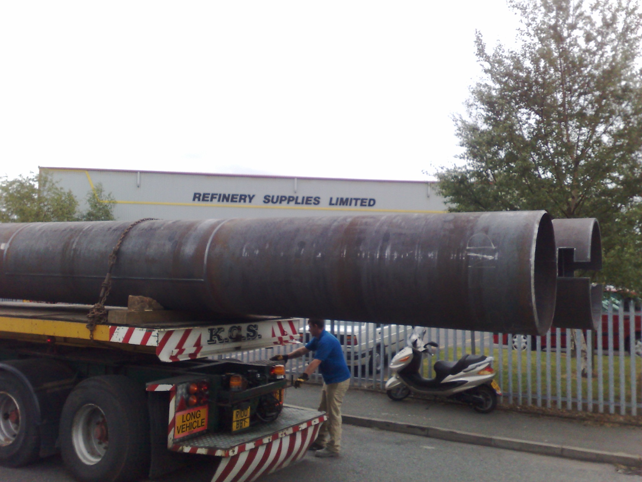 Steel piling tubes being transported from the Refinery Supplies factory