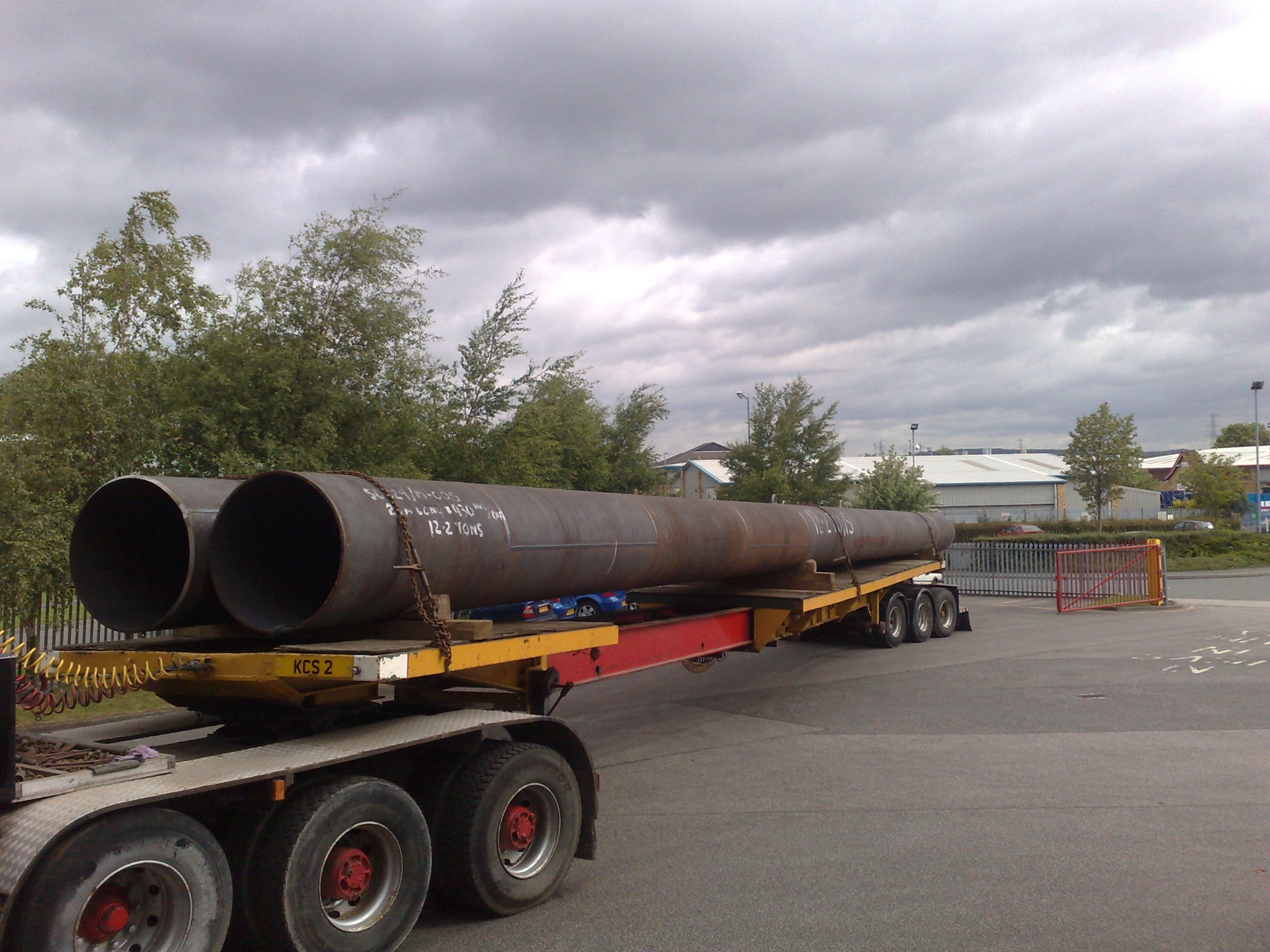 Large-diameter steel piling tubes manufactured by Refinery Supplies and prepared for transport